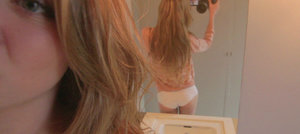 18 year old female Chloe Dash undressing on yoga mat on lawn